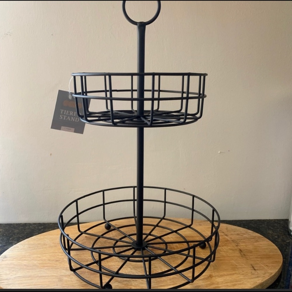 Black two tiered metal rack